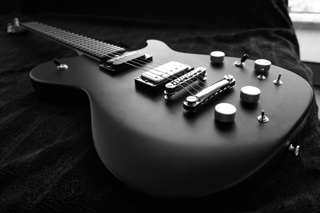 A close up of a guitar